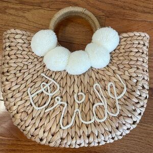 Woven Straw “Bride” Bag with White Pom Poms